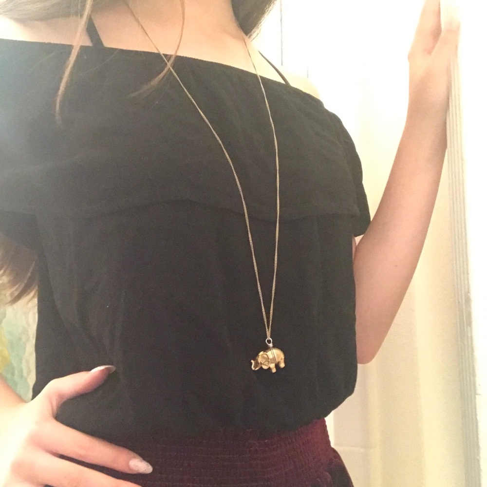 Subdued Off-the-Shoulder Ruffle Black Top